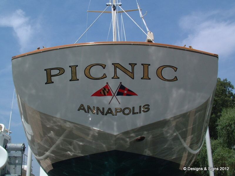 Gold Leaf Boat Name. Sailboat Lettering on Picnic.