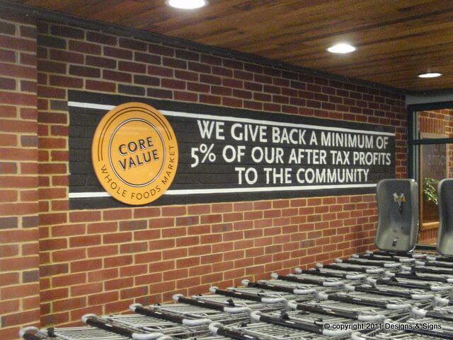 Architectural Mural; We Paint Lettering on Brick at WFM Annapolis.