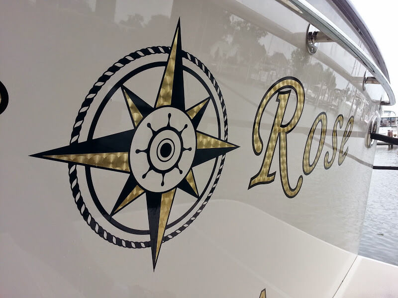 Yacht Lettering, a Gold Leaf Boat Name on Compass Rose.