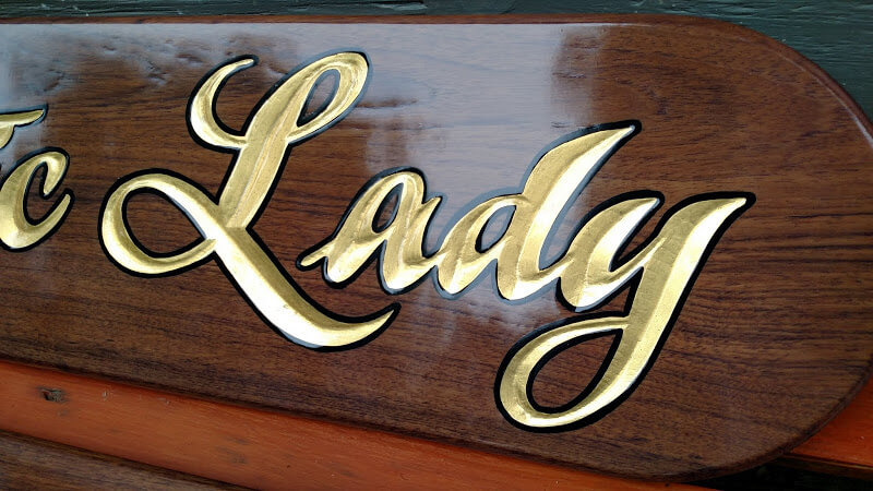 gold leaf lettering on teak name board Mahogany Quarterboards