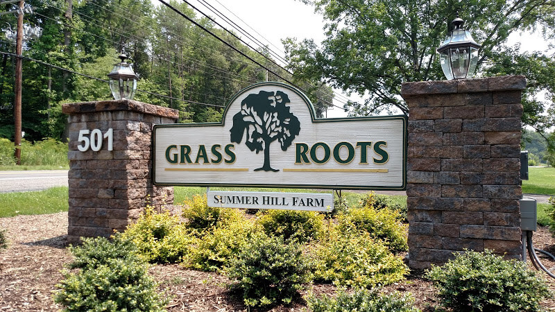 Grass Roots – This New Sandblasted Sign Looks Great on Central Avenue.