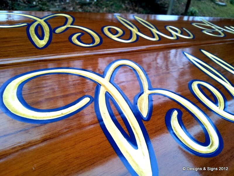 Carved letters with gold leaf and outline