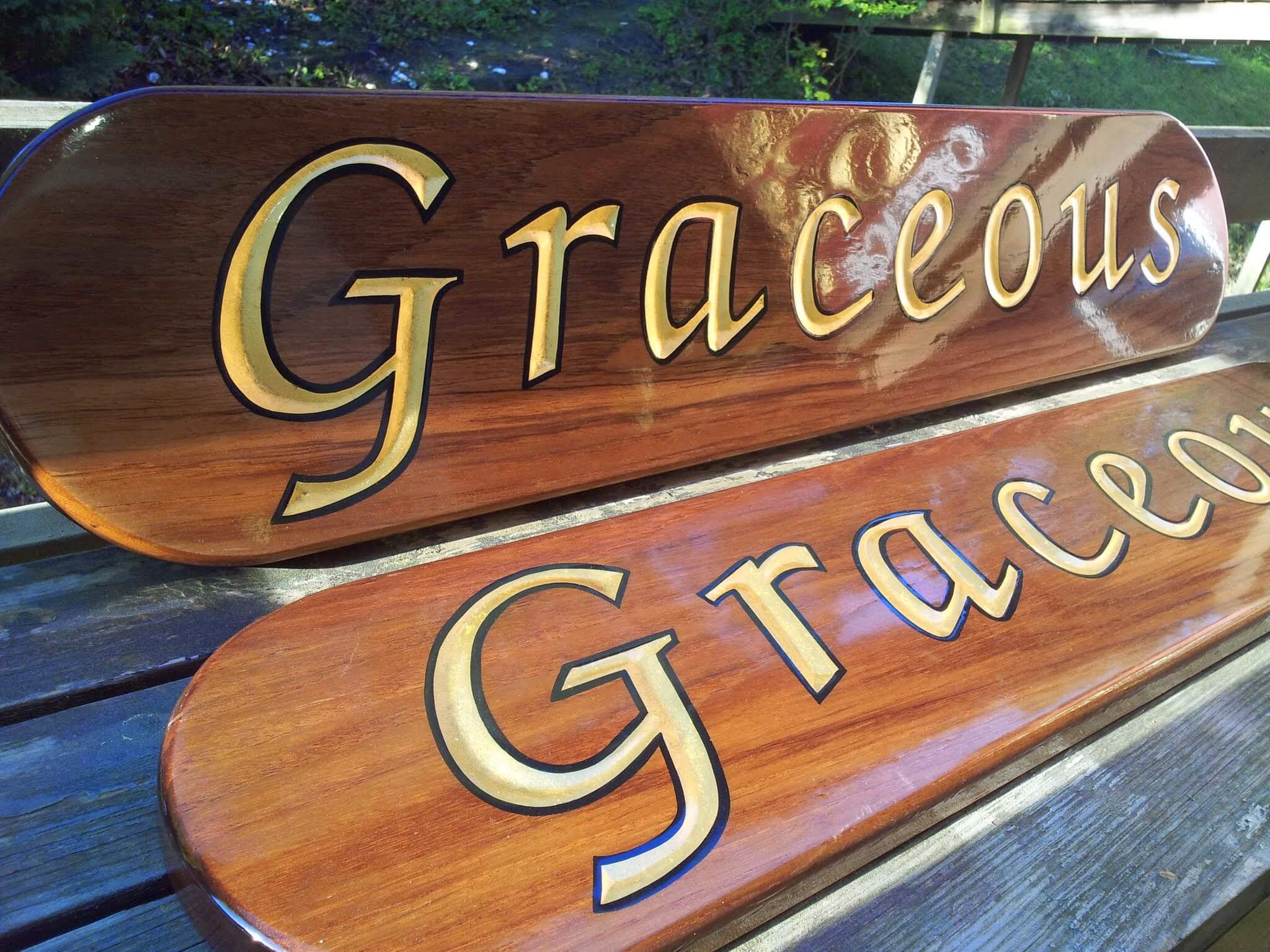 Carved letters with gold leaf