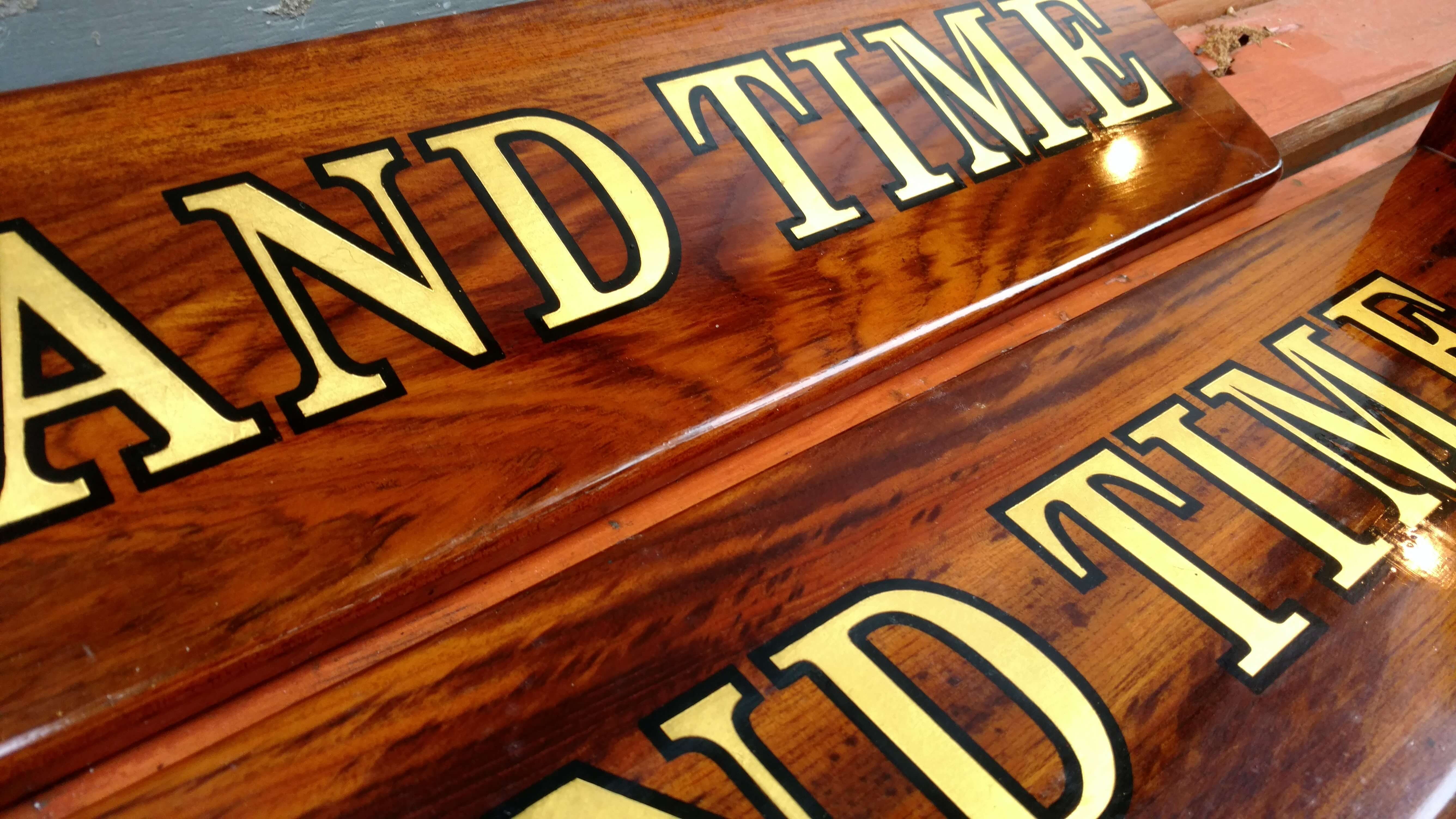 Teak name boards with gold leaf and hand painted outline