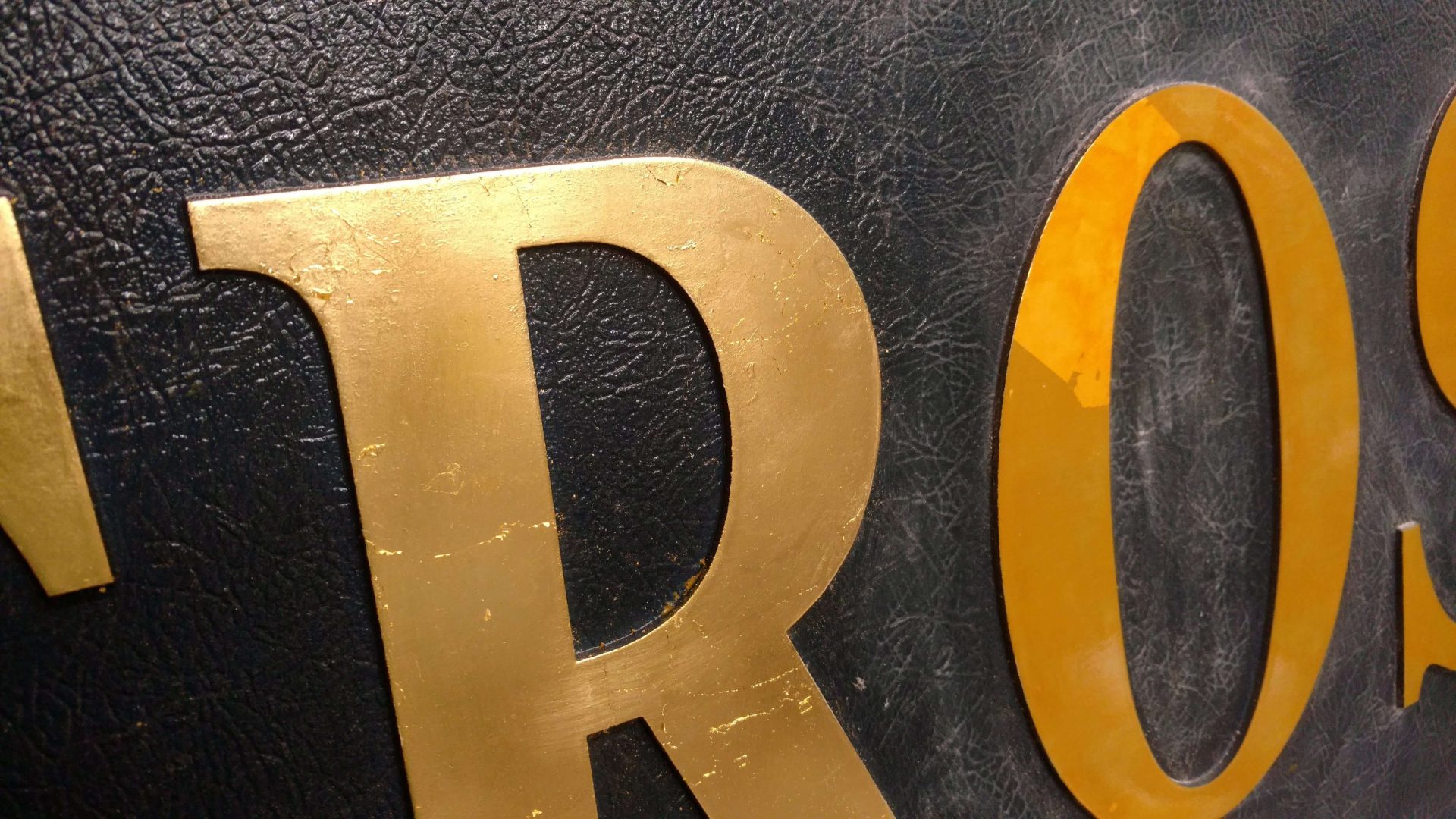 Gold Leaf on Cast Plaque