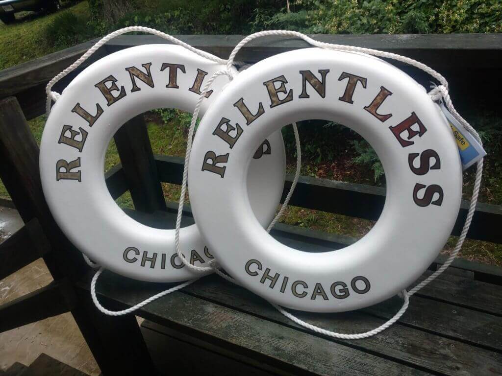 Premium Photo | Closeup of a lifebuoy as a decoration for a fish restaurant  blue lifebuoy on the railing