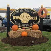 sandblasted cedar sign with gold leaf