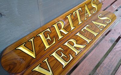 Carved boat name boards. Veritas with gold leaf!