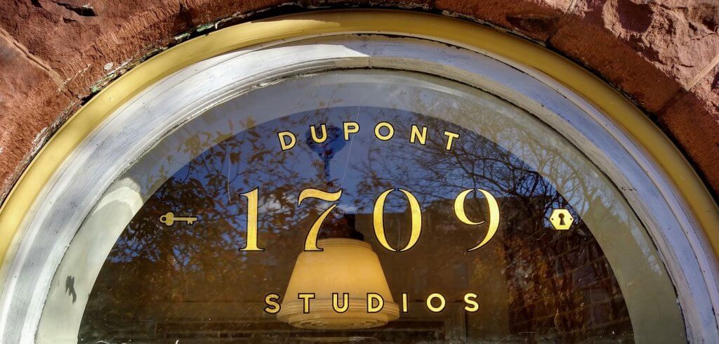 gold leaf lettering on glass