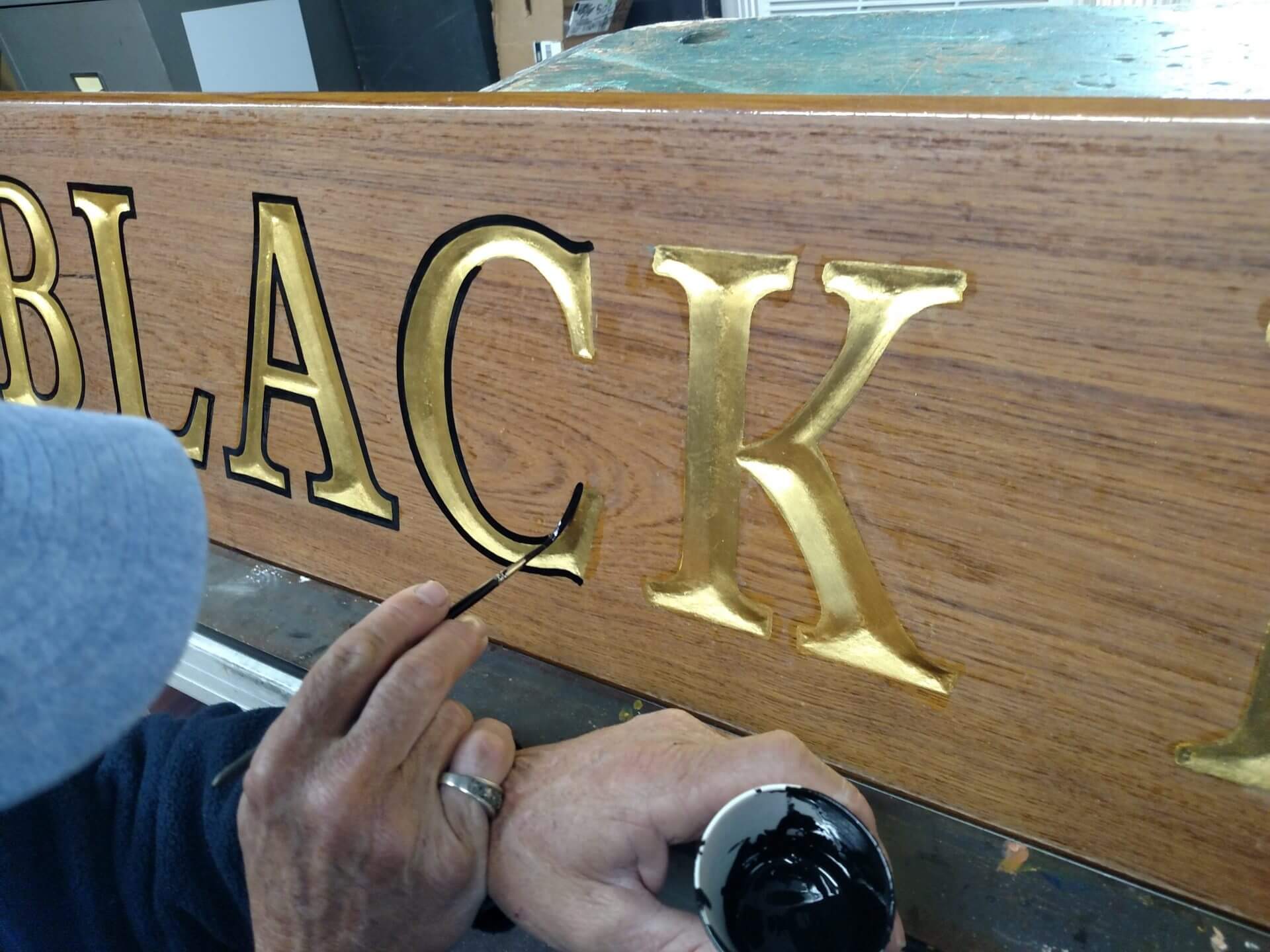 Carved Teak Nameboard: Gold Leaf Letters Outlined by Hand