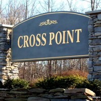 stone pillars sandblasted sign gold leaf